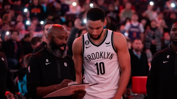 Brooklyn Nets head coach Jacque Vaughn with guard Ben Simmons